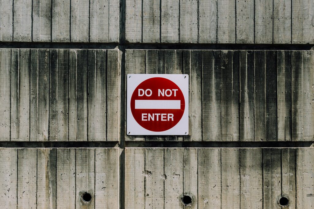 A white-and-red &lsquo;Do Not Enter&rsquo; sign.